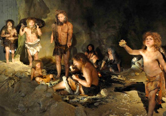 A group of Neanderthals in a cave. Image credit: Tyler B. Tretsven.