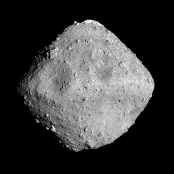 This image of the asteroid Ryugu was captured by the Optical Navigation Camera - Telescopic (ONC-T) on JAXA’s Hayabusa-2 spacecraft on June 26, 2018, from a distance of 13.7 miles (22 km). Image credit: JAXA / University of Tokyo / Kochi University / Rikkyo University / Nagoya University / Chiba Institute of Technology / Meiji University / Aizu University / AIST.
