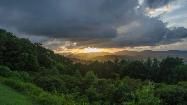 A mountain range at sunset